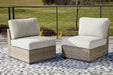 Calworth Outdoor Armless Chair with Cushion (Set of 2) image